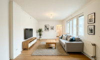 Wohnung - 2301, Groß-Enzersdorf - KERNSANIERT - ERSTBEZUG - BEZIEHBAR AB 01.12.2025 - CHARMANTE 2 ZIMMER-WOHNUNG - MODERNES DESIGN - LICHTDURCHFLUTET - GROß-ENZERSDORF