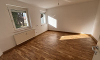 Wohnung - 4400, Steyr - Minimaler Preis für maximalen Komfort: hochwertig sanierte Singlewohnung begeistert mit sonniger Raumaufteilung und herrlich ruhiger Grünlage am Stadtrand von Steyr!