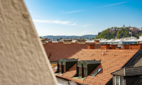 Wohnung - 8020, Graz - Über den Dächern der Stadt: Modernisierte 1,5-Zimmer-Wohnung mit Schlossberg-Blick!