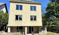Haus - 1230, Wien - Großzügiges Zweifamilienhaus mit Ausbaupotential auf 4 Ebenen in Wien-Atzgersdorf
