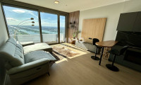 Wohnung - 1220, Wien - Möbliertes Apartment im 42. Stock mit Weitblick auf die Donau! Pool, Spa und Fitness inklusive!