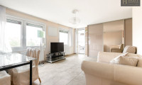 Wohnung - 1100, Wien - Moderne 2-Zimmer-Wohnung mit verglaster Veranda in beliebter Thermensiedlung Oberlaa – Ruhelage mit perfekter Infrastruktur