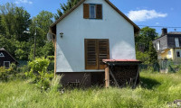 Haus - 1130, Wien - Charmantes Kleingartengrundstück in Hietzinger Grünruhelage mit Altbestand & großem Entwicklungspotenzial (Ober St. Veit)