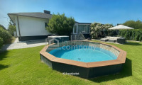 Haus - 2231, Strasshof an der Nordbahn - Moderner Bungalow in Strasshof: Pool, 151m², Garten, 2 Garagen, Top Ausstattung!