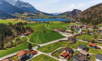 Grundstück - 6345, Kössen - Attraktive Grundstückshälfte für Doppelhausbebauung in sonniger Lage von Kössen