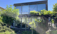 Haus - 1230, Wien - Modernes Kleingartenhaus mit beeindruckenden Fensterfronten & traumhaftem Garten in 1230 Wien