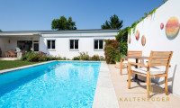 Haus - 2344, Maria Enzersdorf - Großzügiger Bungalow mit Pool, hochwertig ausgebautem Untergeschoß und bemerkenswerter Energieeffizienz in der Südstadt