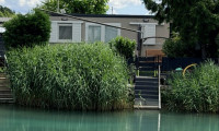 Haus - 2524, Teesdorf - Neuwertige Seeliegenschaft-Minihaus bei Baden, 2 Zimmer, Garten, Terrasse, Stellplatz!