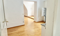 Wohnung - 2380, Perchtoldsdorf - Charmante 2-Zimmer-Altbauwohnung mit Gewölbedecken und großzügigem Wohnbereich in zentraler Lage von Perchtoldsdorf