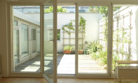 Wohnung - 1130, Wien - RARITÄT – ein ungewöhnliches Ensemble: Charmante Maisonette mit Patio und Studio/Kleinwohnung und Garagenplatz