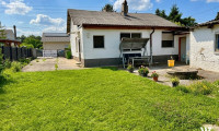 Haus - 2231, Strasshof an der Nordbahn - Einfamilienhaus mit außergewöhnlichem Entwicklungspotenzial auf ca. 1.300 m² Baugrund | Strasshof | BW-3WE