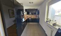 Wohnung - 2320, Mannswörth - Neuwertige 4-Zimmer-Wohnung in Mannswörth mit Balkon, Terrasse & Garage – 104m² Wohnkomfort!