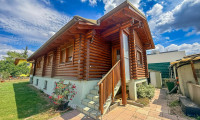 Haus - 1210, Wien - Chalet-Feeling mitten in Donaufeld - Naturstamm-Blockhaus mit Sauna, Kamin und Garten