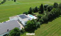 Haus - 4892, Pfaffing - Wohnen und arbeiten in einzigartiger Kombination – moderner Bungalow mit Poollandschaft und Gewerbehalle