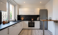 Wohnung - 1100, Wien,Favoriten - TOP-INVESTMENT (55 m²) nahe U1: Vollsanierter Erstbezugs-Traum im 3. Liftstock – Moderne Wohnküche, Parkblick & getrennt begehbare Zimmer!