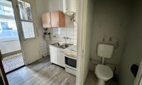 Wohnung - 1100, Wien - RENOVIERUNGSBEDÜRFTIGE SINGLEWOHNUNG MIT WC