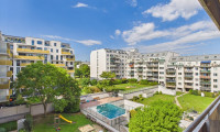 Wohnung - 1110, Wien - Lichtdurchflutetes Studioapartment mit Loggia, Garagenplatz und Swimmingpool