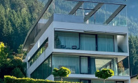 Wohnung - 6212, Eben am Achensee - Achensee: Luxuswohnung in der Architektenvilla der Superlative – Top W1 mit Seeblick, ca. 135 m² Wohnfläche, ca. 160 m² Privatgarten, ca. 25,18 m² Balkon & 2 Tiefgaragenstellplätze inklusive