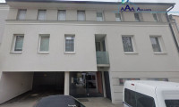 Wohnung - 2120, Wolkersdorf im Weinviertel - Neuwertige 2-Zi-Wohnung in Wolkersdorf mit Balkon, Einbauküche & Aufzug