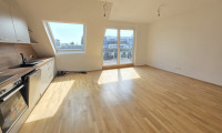 Wohnung - 1220, Wien - Sonnige 3-Zimmer-Dachgeschosswohnung mit neuwertiger Ausstattung