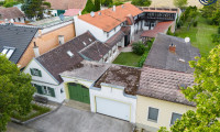 Haus - 2301, Groß-Enzersdorf - Großzügige Immobilien für ruhiges Wohnen und Gewerbe - Große Lagerhalle + Garten