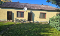 Haus - 2404, Petronell-Carnuntum - Bungalow mit großem Grundstück, Nebengebäude und vielseitigem Potenzial in Petronell-Carnuntum