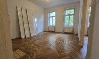 Wohnung - 1140, Wien - 3-Zimmer-Wohnung Altbauwohnung im Hochparterre mit großem Potenzial und einem bezaubernden Grünblick (über 1.000m2 Gemeinschaftsgarten)