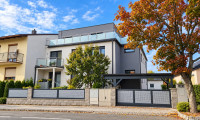 Wohnung - 2440, Moosbrunn - Großzügige 4-Zimmer-Gartenwohnung in einem Zweiparteienhaus in Moosbrunn